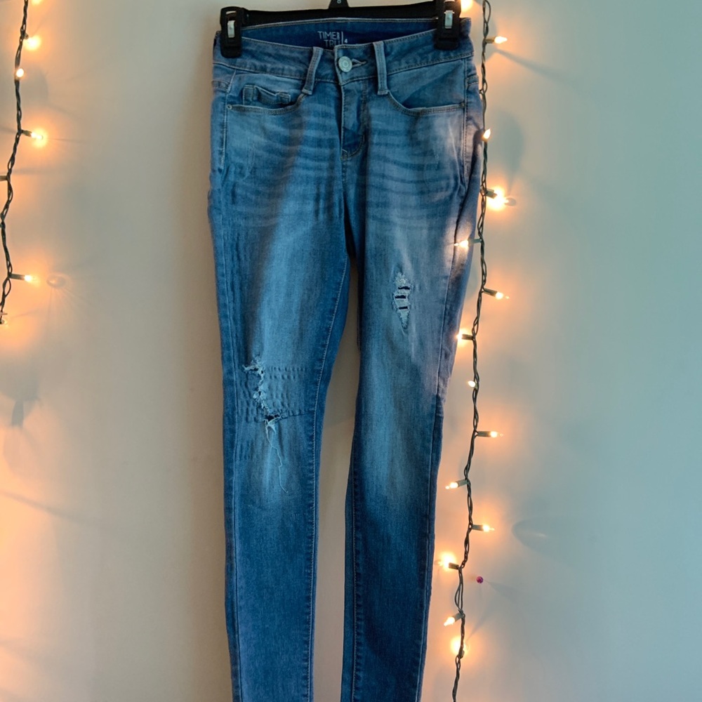 Ripped blue skinny jeans